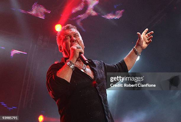 Jimmy Barnes of Cold Chisel performs during a Cold Chisel concert at ANZ Stadium on December 5, 2009 in Sydney, Australia.