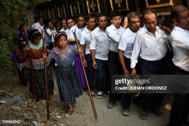 Indigenous catholic devotees take part in the Justo Juez procession within Holy Week celebrations, in Chinautla municipality 15 km north of Guatemala...