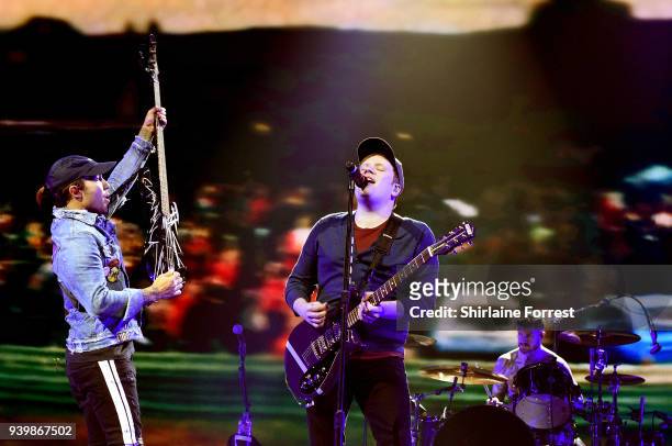Pete Wentz, Patrick Stump and Andy Hurley of Fall Out Boy perform at Manchester Arena on March 29, 2018 in Manchester, England.