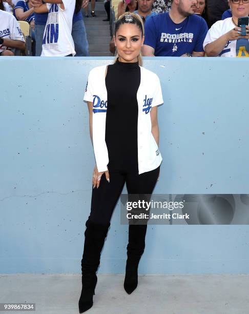 Singer Pia Toscano attends a baseball game between San Francisco Giants and Los Angeles Dodgers on Opening Day at Dodger Stadium on March 29, 2018 in...