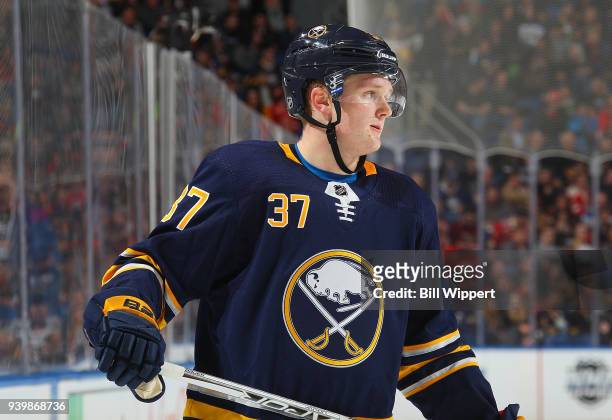 Casey Mittelstadt of the Buffalo Sabres awaits a face-off against the Detroit Red Wings during an NHL game on March 29, 2018 at KeyBank Center in...