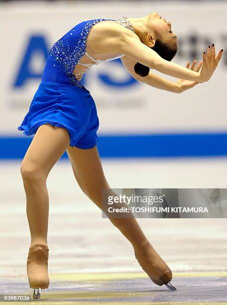 Kim Yu-Na of South Korea performs her free skating during the ladies' competition in the figure skating ISU Grand Prix Final in Tokyo, on December 5,...
