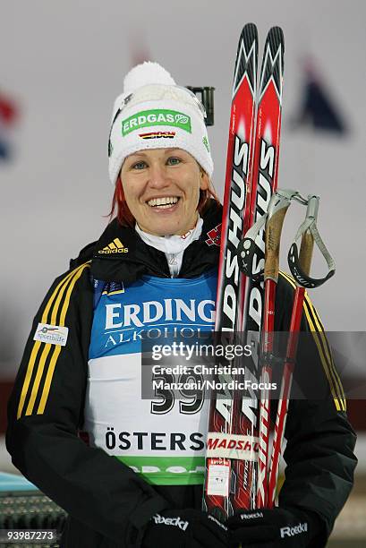 Kati Wilhelm of Germany looks on during the Flower Ceremony of Women's 7.5 km Sprint of the E.ON Ruhrgas IBU Biathlon World Cup on December 5, 2009...