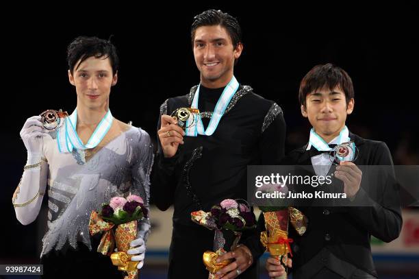 Winner Evan Lysacek of the USA , 2nd placed Nobunari Oda of Japan and Johnny Weir of the USA pose with their medals after competing in the Men Free...