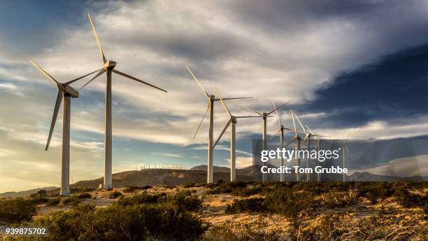 wind powered - wind turbine california stock pictures, royalty-free photos & images