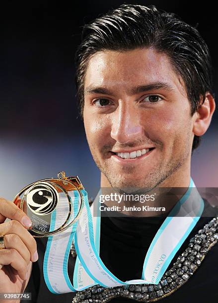 Evan Lysacek of the USA poses with his medal after winning the Men Free Skating on the day three of ISU Grand Prix of Figure Skating Final at Yoyogi...