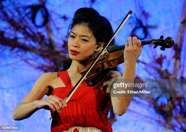 Recording artist Vanessa-Mae performs during the opening night gala for Mandarin Oriental, Las Vegas at CityCenter December 4, 2009 in Las Vegas,...