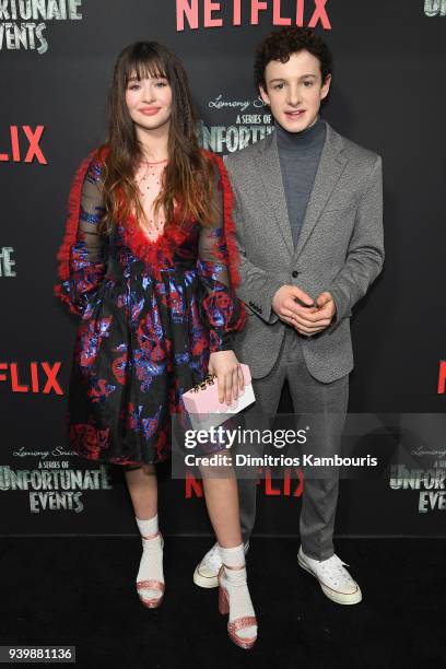 Malina Weissman and Louis Hynes attend the Netflix Premiere of "A Series of Unfortunate Events" Season 2 on March 29, 2018 in New York City.