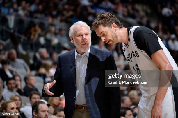 Pau Gasol and Head Coach Gregg Popovich of the San Antonio Spurs talk during the game against the Oklahoma City Thunder on March 29, 2018 at the AT&T...