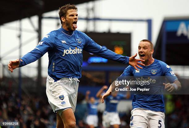 Hermann Hreidarsson of Portsmouth celebrates scoring the opening goal of the match during the Barclays Premier League match between Portsmouth and...