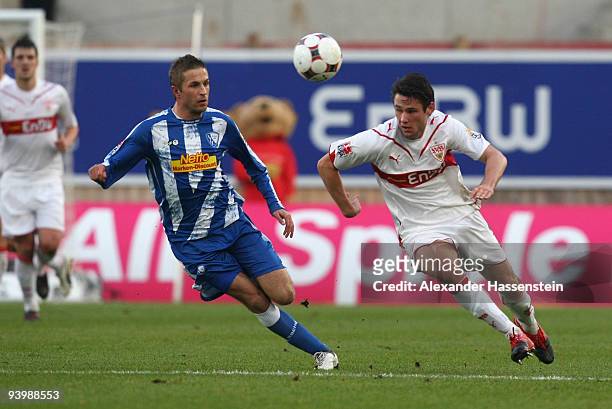 Christian Traesch of Stuttgart battles for the ball with Stanislav Sestak of Bochum during the Bundesliga match between VfB Stuttgart and VfL Bochum...