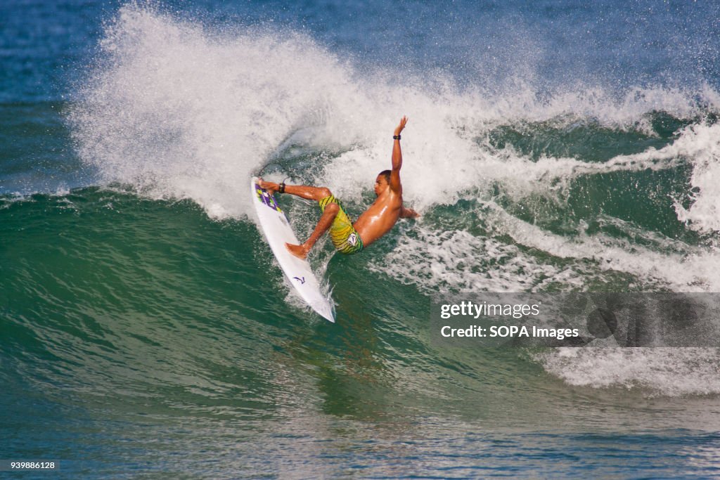 Costa Rican surfer on a wave in Langosta...