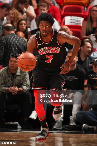 Justin Holiday of the Chicago Bulls handles the ball during the game against the Miami Heat on March 29, 2018 at American Airlines Arena in Miami,...