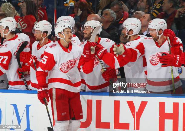 Danny DeKeyser of the Detroit Red Wings celebrates his third period goal during an NHL game against the Buffalo Sabres on March 29, 2018 at KeyBank...