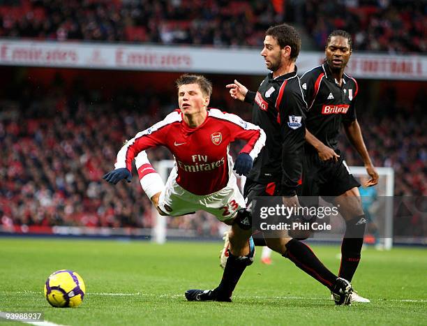 Andrey Arshavin of Arsenal is brought down in the Penalty box by Rory Delap of Stoke City during the Barclays Premier League match between Arsenal...