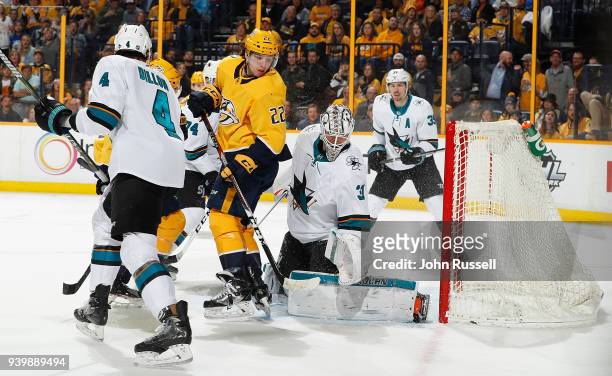Kevin Fiala of the Nashville Predators screens goalie Martin Jones of the San Jose Sharks as a shot by Craig Smith finds the back of the net for a...