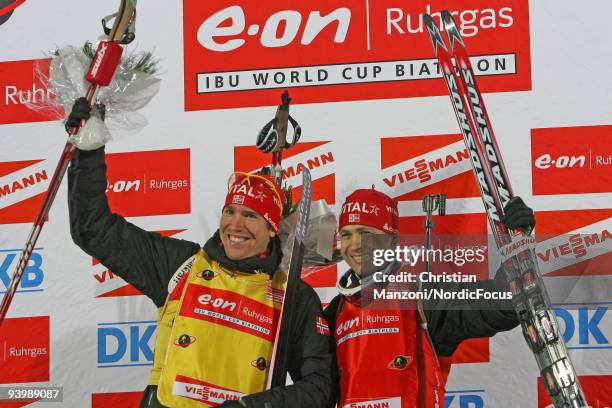 Emil Hegle Svendsen and Ole Einar Bjoerndalen of Norway during the Flower Ceremony after the Men's 10 km Sprint the E.ON Ruhrgas IBU Biathlon World...