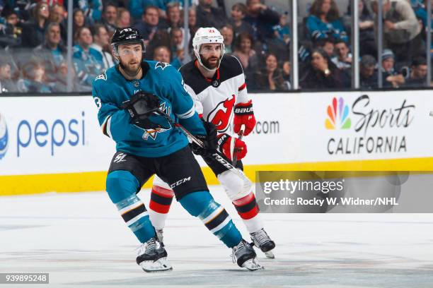 Barclay Goodrow of the San Jose Sharks skates against Kyle Palmieri of the New Jersey Devils at SAP Center on March 20, 2018 in San Jose, California....