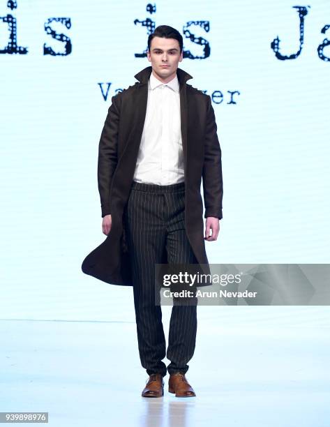 Model walks the runway wearing This is James at 2018 Vancouver Fashion Week - Day 7 on March 25, 2018 in Vancouver, Canada.