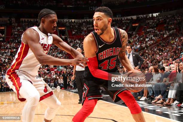 Denzel Valentine of the Chicago Bulls handles the ball during the game against the Miami Heat on March 29, 2018 at American Airlines Arena in Miami,...