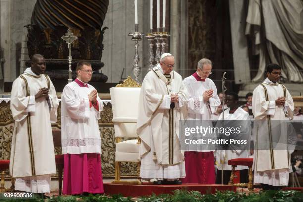 Pope Francis leads the Chrism Mass for Holy Thursday which marks the start of Easter celebrations in St. Peter's Basilica in Vatican City. The Chrism...