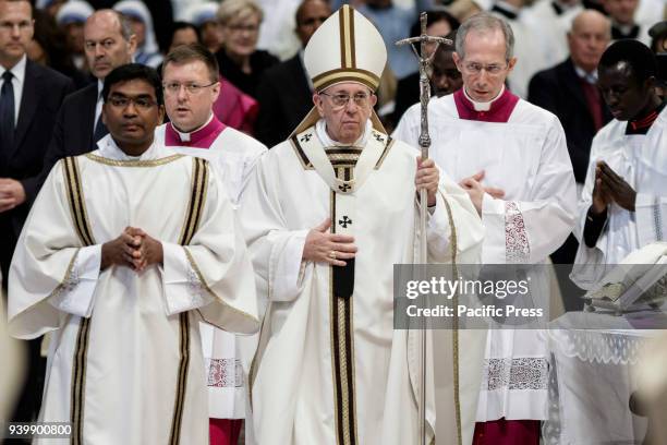 Pope Francis leads the Chrism Mass for Holy Thursday which marks the start of Easter celebrations in St. Peter's Basilica in Vatican City. The Chrism...