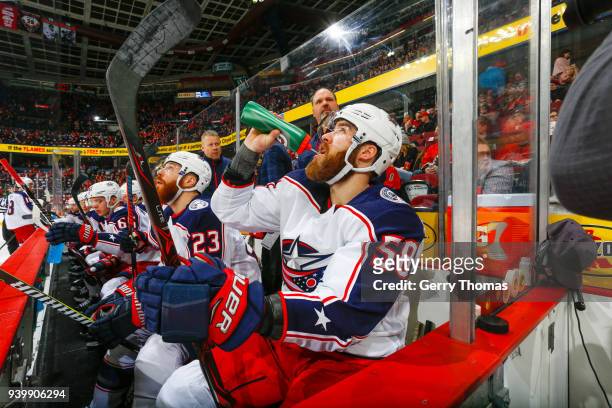 David Savard of the Columbus Blue Jackets takes a break in an NHL game on March 29, 2018 at the Scotiabank Saddledome in Calgary, Alberta, Canada.