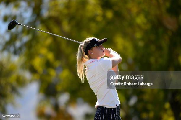 Emily K. Pedersen hits a tee shot on the seventh hole during round one of the ANA Inspiration on the Dinah Shore Tournament Course at Mission Hills...