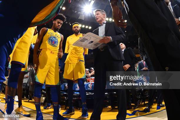 Coach Steve Kerr of the Golden State Warriors discusses a game plan before the game against the Milwaukee Bucks on March 29, 2018 at ORACLE Arena in...