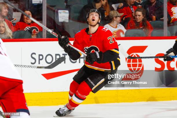 Dougie Hamilton of the Calgary Flames tracks a flying puck in an NHL game on March 29, 2018 at the Scotiabank Saddledome in Calgary, Alberta, Canada.