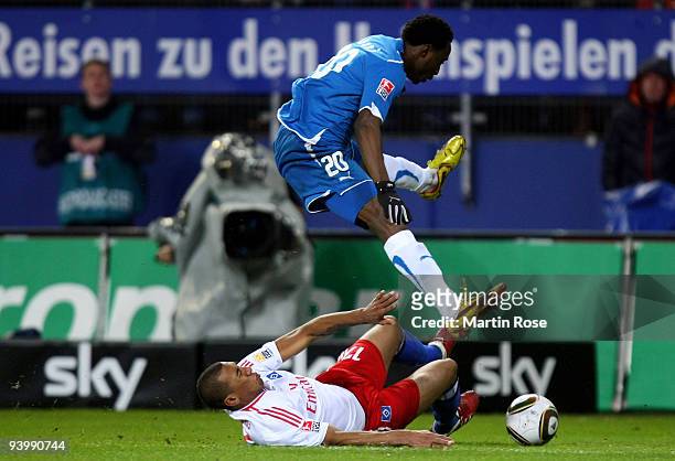 Jerome Boateng of Hamburg and Chinedu Obasi of Hoffenheim battle for the ball during the Bundesliga match between Hamburger SV and 1899 Hoffenheim at...