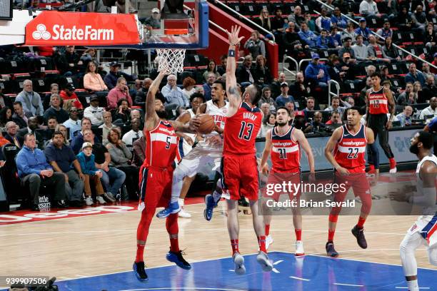 Ish Smith of the Detroit Pistons goes to the basket against the Washington Wizards on March 29, 2018 at Little Caesars Arena in Detroit, Michigan....