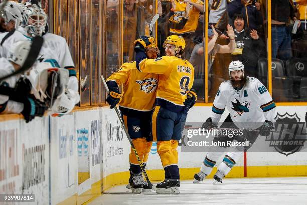 Nick Bonino celebrates his empty net goal with Filip Forsberg of the Nashville Predators against the San Jose Sharks during an NHL game at...