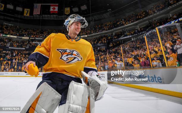 Juuse Saros of the Nashville Predators skates as Third Star of the Game after a 5-3 win against the San Jose Sharks during an NHL game at Bridgestone...