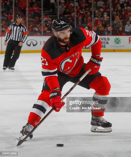 Kyle Palmieri of the New Jersey Devils in action against the Carolina Hurricanes on March 27, 2018 at Prudential Center in Newark, New Jersey. The...