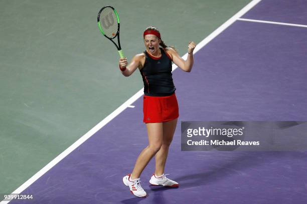 Jelena Ostapenko of Latvia celebrates match point after defeating Danielle Collins of the United States during their semifinal match on Day 11 of the...
