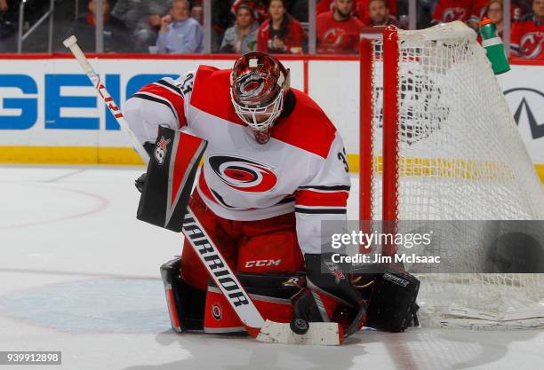 Scott Darling of the Carolina Hurricanes in action against the New Jersey Devils on March 27, 2018 at Prudential Center in Newark, New Jersey. The...