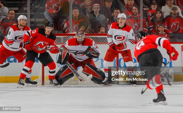 Scott Darling of the Carolina Hurricanes in action against the New Jersey Devils on March 27, 2018 at Prudential Center in Newark, New Jersey. The...