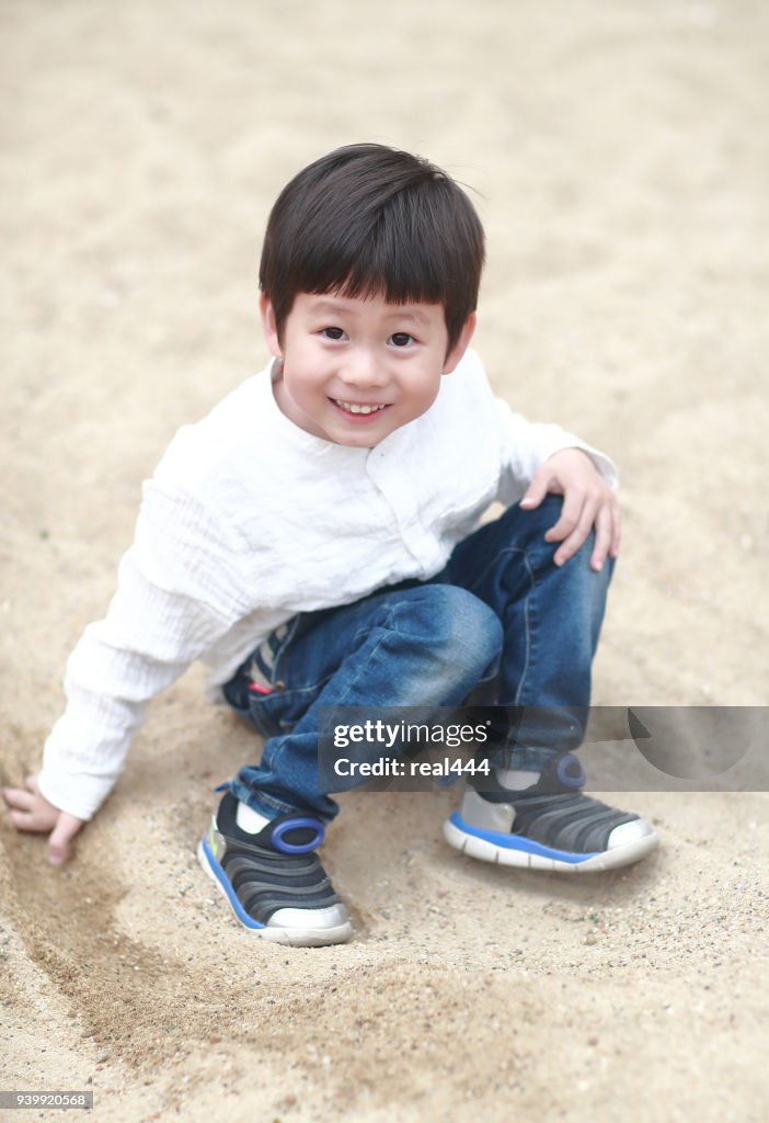 Children playing on the Sandbox