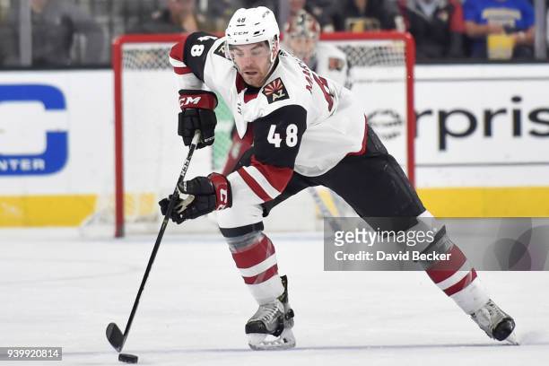 Jordan Martinook of the Arizona Coyotes skates with the puck against the Vegas Golden Knights during the game at T-Mobile Arena on March 28, 2018 in...