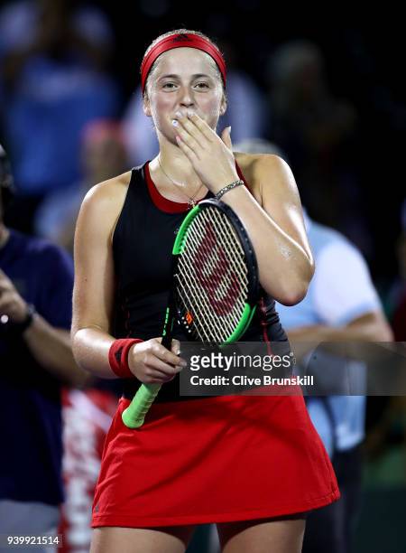 Jelena Ostapenko of Latvia blows a kiss to the crowd after her straight sets victory against Danielle Collins of the United States in their semifinal...