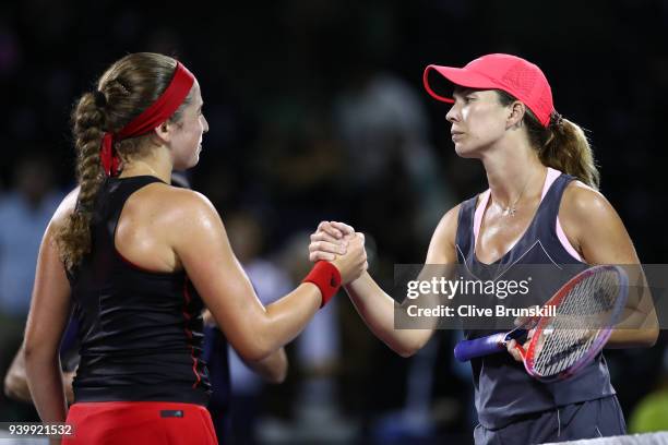 Jelena Ostapenko of Latvia shakes hands at the net after her straight sets victory against Danielle Collins of the United States in their semifinal...