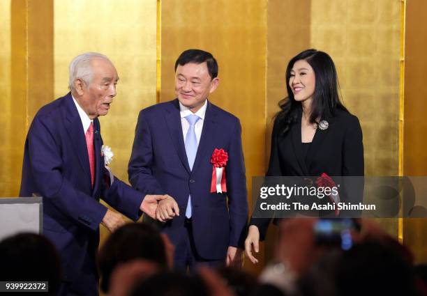 Thai Former Prime Ministers Thaksin and Yingluck Shinawatra attend a book publishing party of veteran lawmaker Hajime Ishii on March 29, 2018 in...