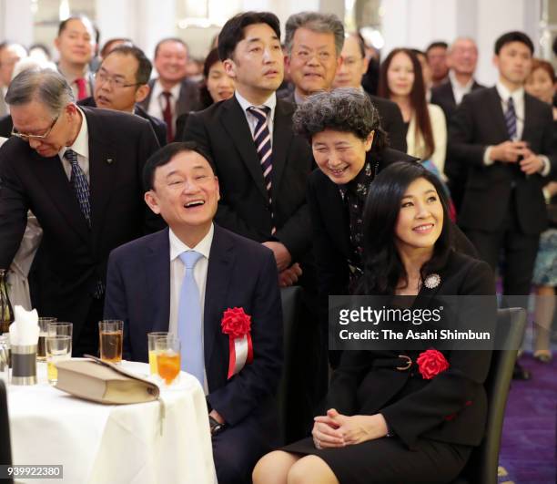 Thai Former Prime Ministers Thaksin and Yingluck Shinawatra attend a book publishing party of veteran lawmaker Hajime Ishii on March 29, 2018 in...