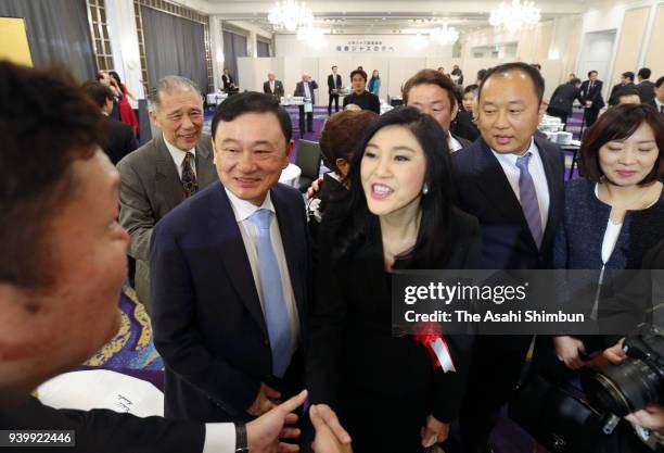 Thai Former Prime Ministers Thaksin and Yingluck Shinawatra attend a book publishing party of veteran lawmaker Hajime Ishii on March 29, 2018 in...