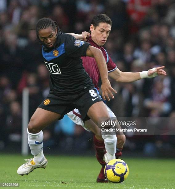 Anderson of Manchester United clashes with Guillermo Franco of West Ham United during the FA Barclays Premier League match between West Ham United...