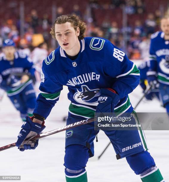 Vancouver Canucks Center Adam Gaudette skates in warm up prior to a NHL hockey game against the Edmonton Oilers on March 29 at Rogers Arena in...
