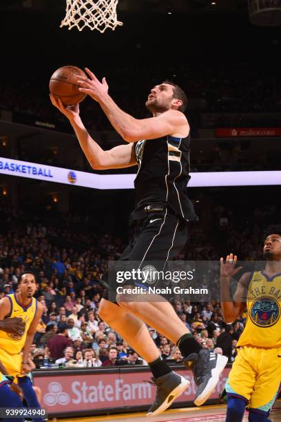 Tyler Zeller of the Milwaukee Bucks goes to the basket against the Golden State Warriors on March 29, 2018 at ORACLE Arena in Oakland, California....