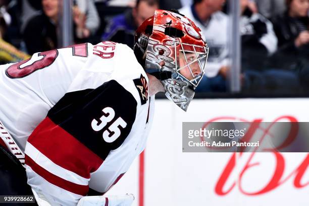 Darcy Kuemper of the Arizona Coyotes waits for a face-off during the game against the Los Angeles Kings on March 29, 2018 at Staples Center in Los...