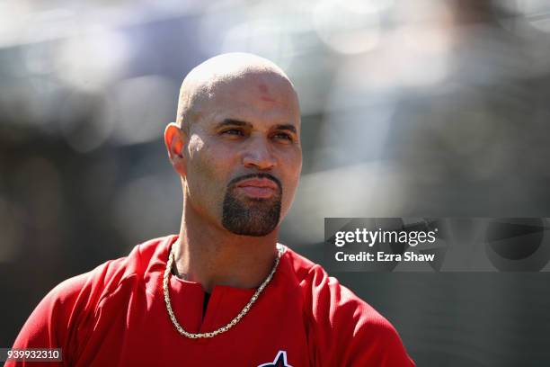 Albert Pujols of the Los Angeles Angels stands on the field during batting practice before their game against the Oakland Athletics at Oakland...